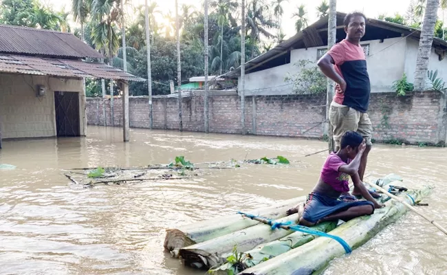 Assam Floods 2022: Heavy Floods Damaged Lakhs People At Shelters - Sakshi