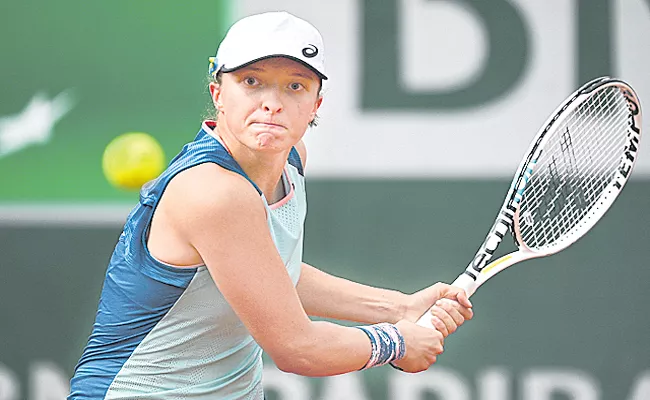 French Open: Iga Swiatek enter to Pre-Quarter Final - Sakshi