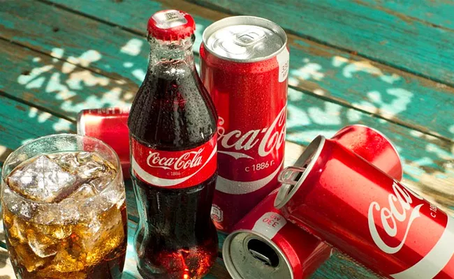 Coca Cola Going To Increase Its Soft Drink Prices - Sakshi