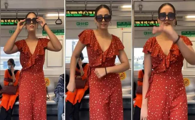 Woman Jiggle Jiggle Dance In Delhi Metro - Sakshi