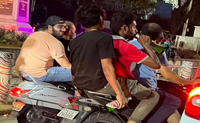 Drunk And Drive With Three Members In Bike Photo Social Media Hyderabad - Sakshi