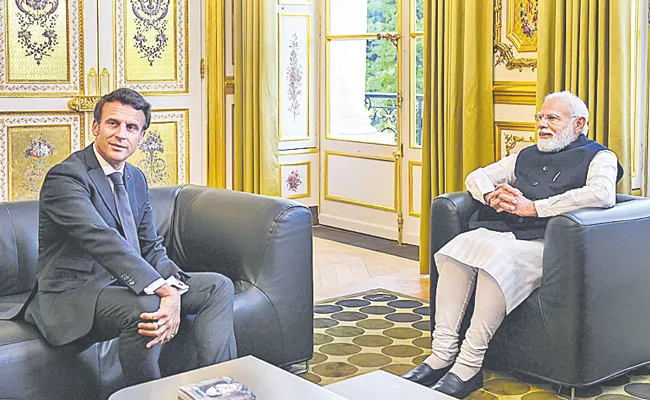 PM Modi Met French President Return To India After Europe Visit - Sakshi