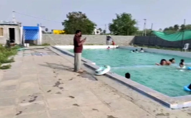 Cell Phone Camera Swimming pool Video Recording Suryapet District - Sakshi