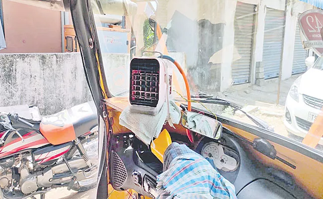 Auto Driver Installed Small Cooler In Auto Works With Solor In Nirmal District - Sakshi