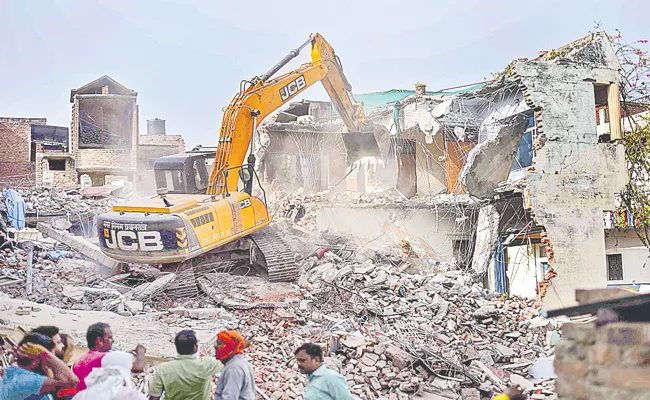 Prophet remarks row: UP govt brings out bulldozers in 2 cities - Sakshi