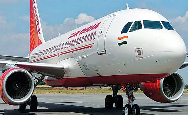 DGCA Fined Air India fined Rs 10L for not compensating flyer denied boarding - Sakshi