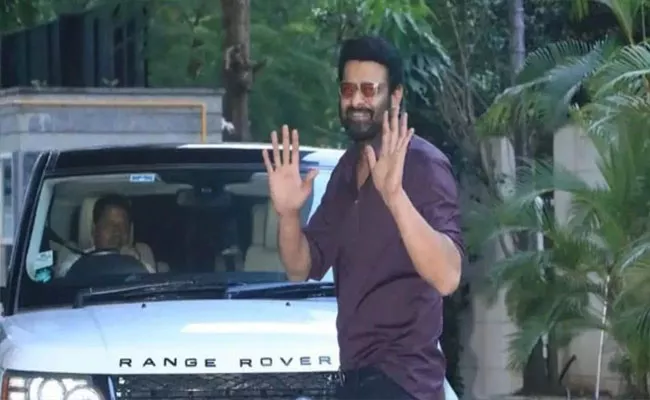 Prabhas New look Goes Viral After Meet Director Om Raut - Sakshi