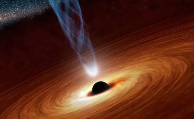 Fastest Growing Black Hole Devouring Earth Like Mass Every Second - Sakshi