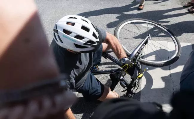 Viral Video: US President Joe Biden Falls Off Bike Goes Viral  - Sakshi