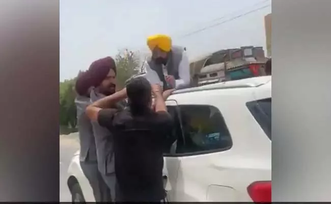 Punjab Chief Minister Bhagwant Mann Meets Protester Amid Agnipath  - Sakshi