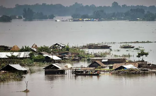 Rail, road links in Northeast India badly hit by floods and landslides - Sakshi