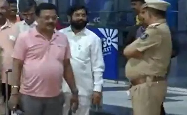 Eknath Shinde, Shiv Sena Rebel MLAs at Surat Airport - Sakshi