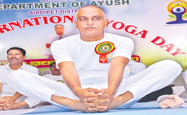 Telangana Minister Harish Rao Participated In International Yoga Day 2022 - Sakshi