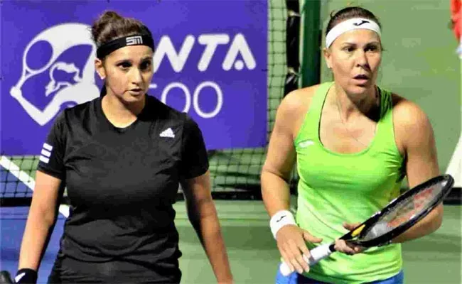 Sania Mirza, Lucie Hradecka Pair Knocked Out In First Round Of Rotse Open Doubles - Sakshi