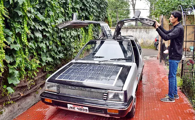 A Kashmiri mathematician teacher Bilal Ahmed innovated a solar car - Sakshi