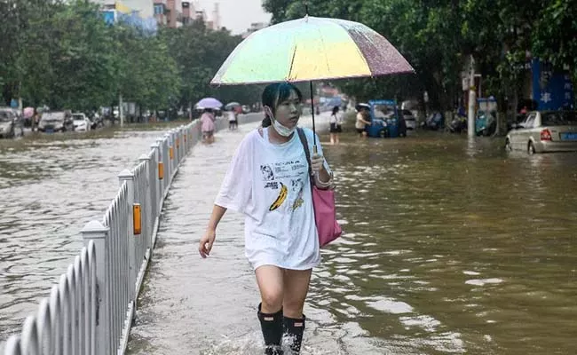 South China Province Raise Historic Record Floods - Sakshi