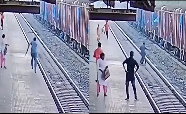 Viral Video: Indian Railways Employee Saves Life of Man - Sakshi