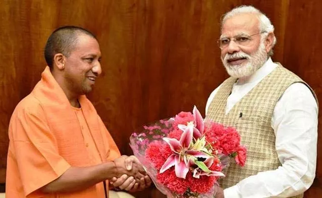 Modi Birthday Greetings To UP CM Yogi Adityanath - Sakshi