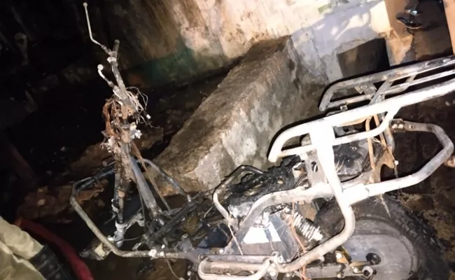 House Caught Fire Due To Exploded Of Electric ScooterAt Dubbaka - Sakshi