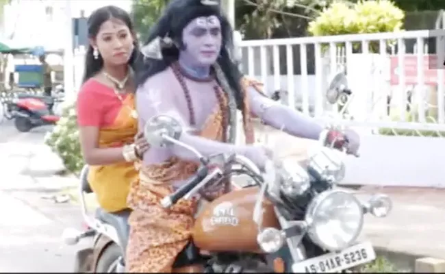 Assam Man Dressed Up as Lord Shiva to Protest Against Price Rise Detained - Sakshi