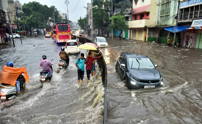 Heavy Rains over Next Two Days in Telangana: IMD - Sakshi