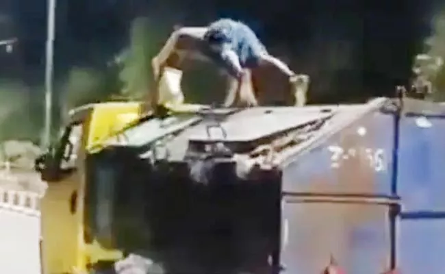 UP Man is Seen Doing Push Ups on Top of a Moving Truck Viral - Sakshi