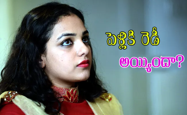 Nithya Menen Wedding Rumors Goes Viral With a Malayalam Actor - Sakshi