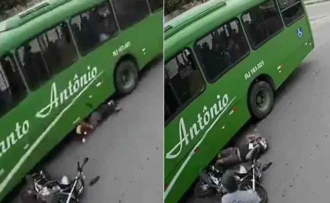 Bengaluru Police Shares Video Of Biker Escaping Death - Sakshi