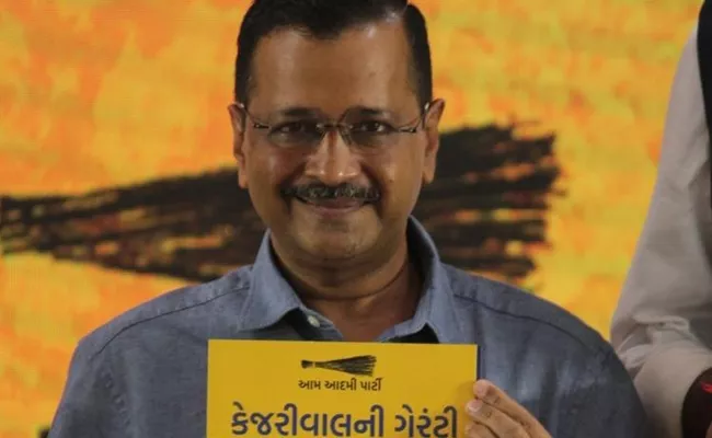 AAP Will Provide 300 Units Free Electricity in Gujarat Arvind Kejriwal - Sakshi