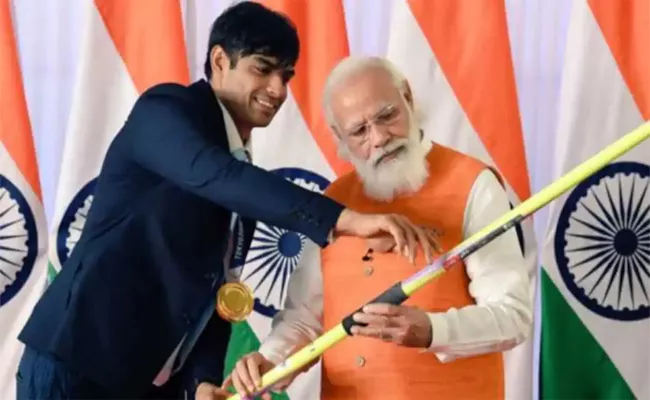 PM Modi Congratulates Neeraj Chopra On Winning Silver Medal At World Championships - Sakshi