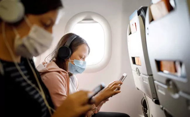 Why Switch Off Mobile Phone In Airplane Mode During A Flight - Sakshi