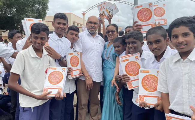 Pai International Distributed 1.1 Lakh Notebooks To 12,226 Students In Tumkur - Sakshi