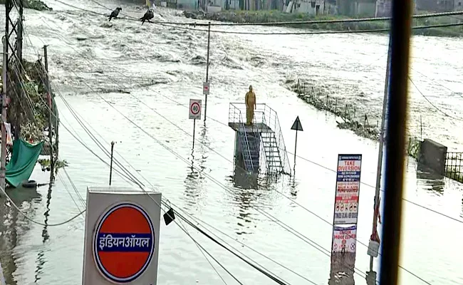 Musarambagh Bridge Submerged In Flood Water At Hyderabad - Sakshi