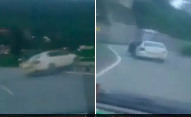 Viral Video: Car Stunt Goes Wrong As Driver Jumps Over Divider - Sakshi