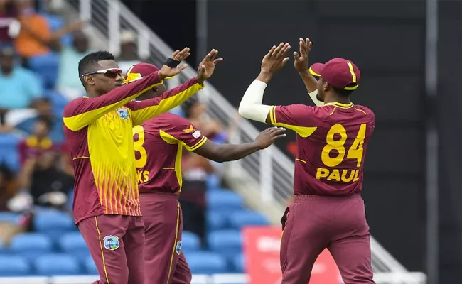 West Indies Fined 20 Percent Match Fees For Slow Over Rate In 1st T20I vs India - Sakshi