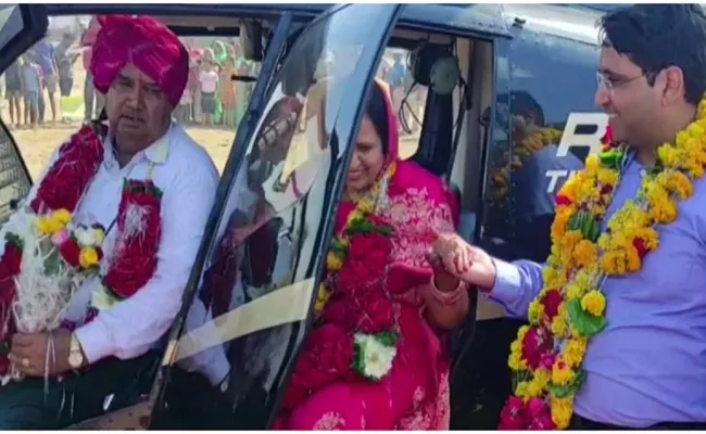 Viral: A Son Gifted His Mother Helicopter Ride As a Retirement Gift in Ajmer - Sakshi