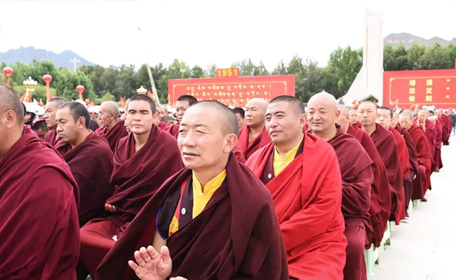 China Intends To Forcibly Relocate Over 1 Lakh Tibetans By 2030 - Sakshi