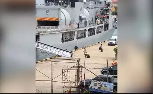 Three Men Carrying Large Suitcases In Sri Lanka Navy Ship Goes Viral - Sakshi