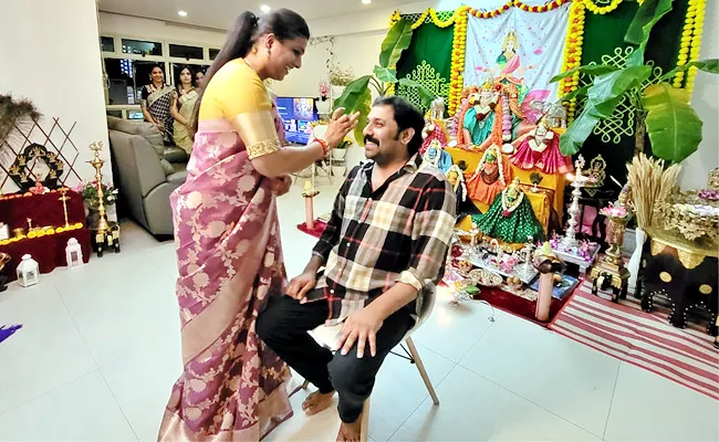 AP Minister Roja celebrated Rakhi with his brother Arjun Reddy in Singapore - Sakshi