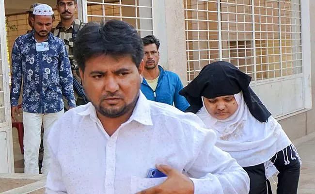 Husband Of Bilkis Bano Surprised 11 Life Term Convicts Get Released - Sakshi