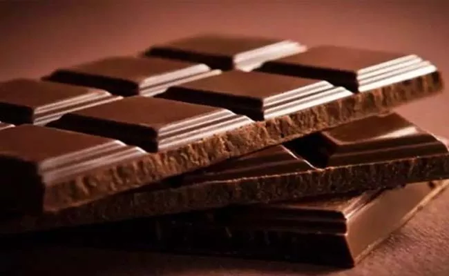 Chocolates worth Rs 17 lakh stolen from a Cadbury godown in Up - Sakshi