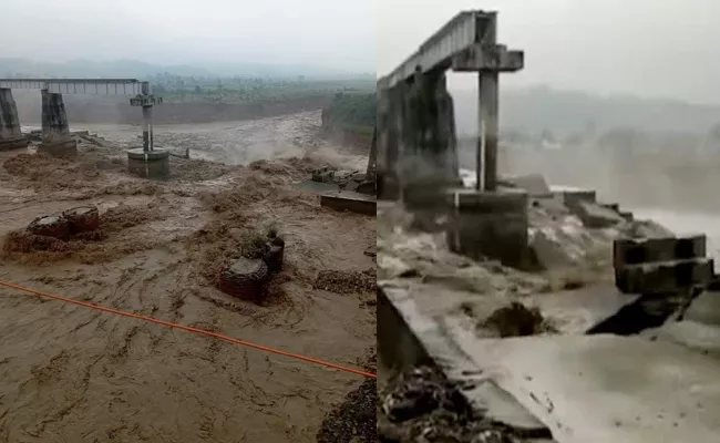 Railway Bridge Collapses Amid Heavy Rainfall In Himachal Kangra - Sakshi