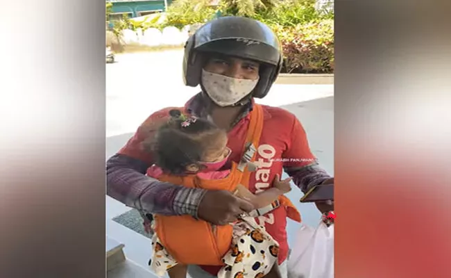 Zomato Delivery Agent Carries His Kids To Work Melting Hearts - Sakshi