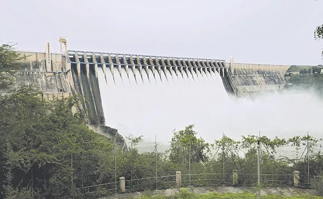 Flood surged into Srisailam dam Andhra Pradesh - Sakshi