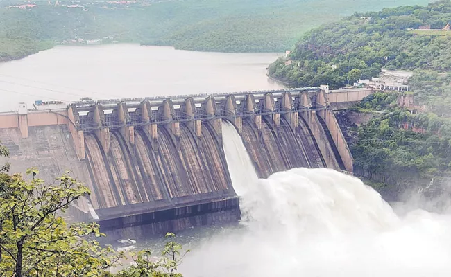 Water level in Srisailam project has increased further with Floods - Sakshi