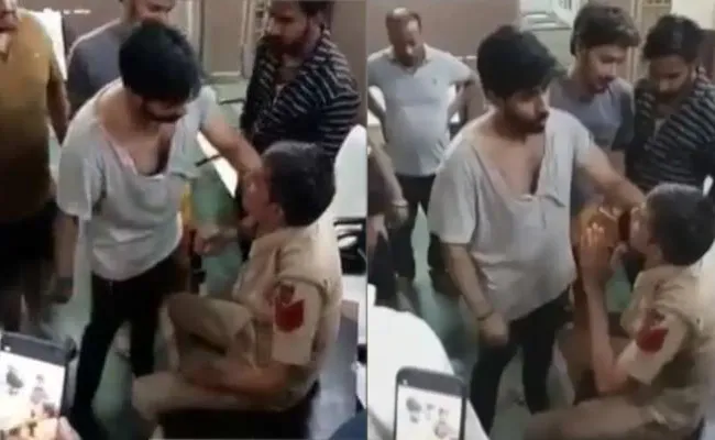 Police Constable Assaulted At Anand Vihar Police Station Viral - Sakshi