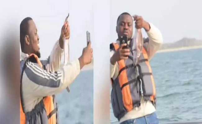 Viral Video: Fish Back Into The Water Man Flinged His Phone - Sakshi