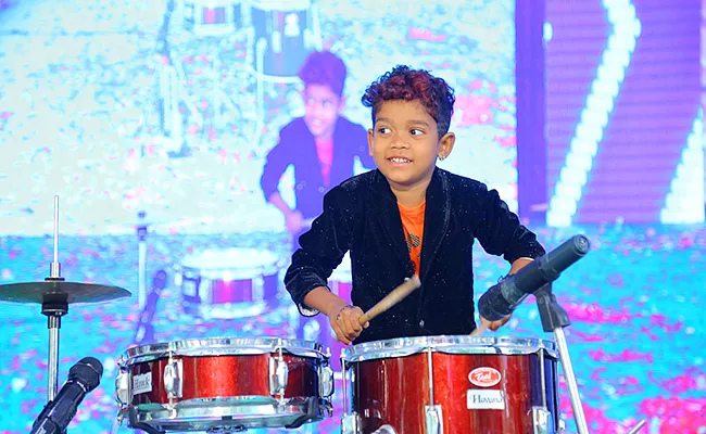 Vijayawada Kid Cherry SWaroop Plays Drums With Extraordinary Efficiency - Sakshi