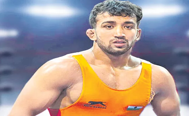 World Wrestling Championships: Naveen Malik loses bronze medal match - Sakshi