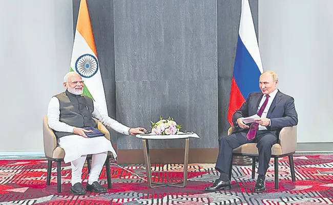 Shanghai Cooperation Organisation: PM Narendra Modi meets Russia President Putin in Sakarmand - Sakshi